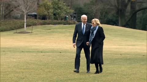 When Biden drops down Air Force one he does a strange gesture to the marine