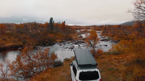 Campervan near a river