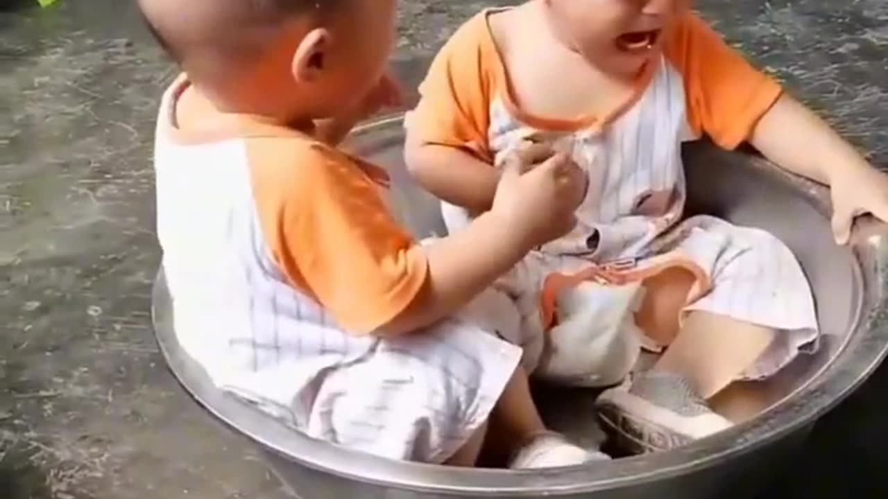 Small babies funny fight