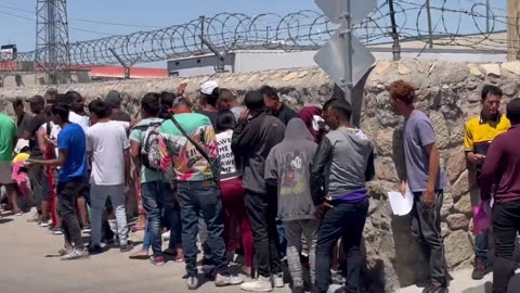 MASSIVE Group of Migrants Line Up for Biden's Taxi Service (VIDEO)