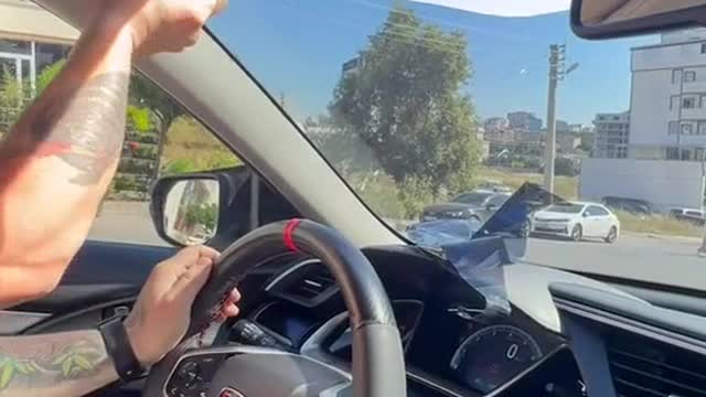 Tear off the protective film on the car glass.