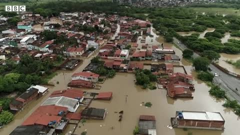 Dams burst in Brazil as deadly flooding continues - BBC News