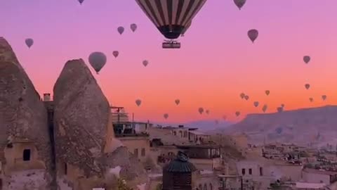 Sunset bliss over Cappadocia's fairy tale-like landscapes 🎈🌌