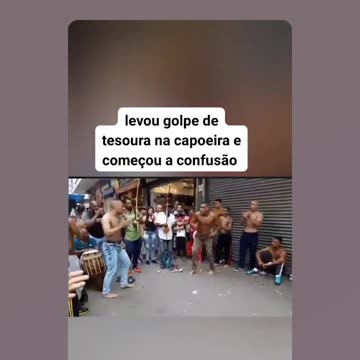 Scissors Blow in Capoeira and cheering crowd with zueira