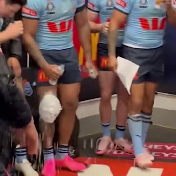 NSW Blues having a Tooheys celebration moment after Origin