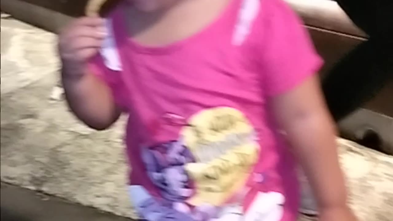 Cute baby girl with funny reaction