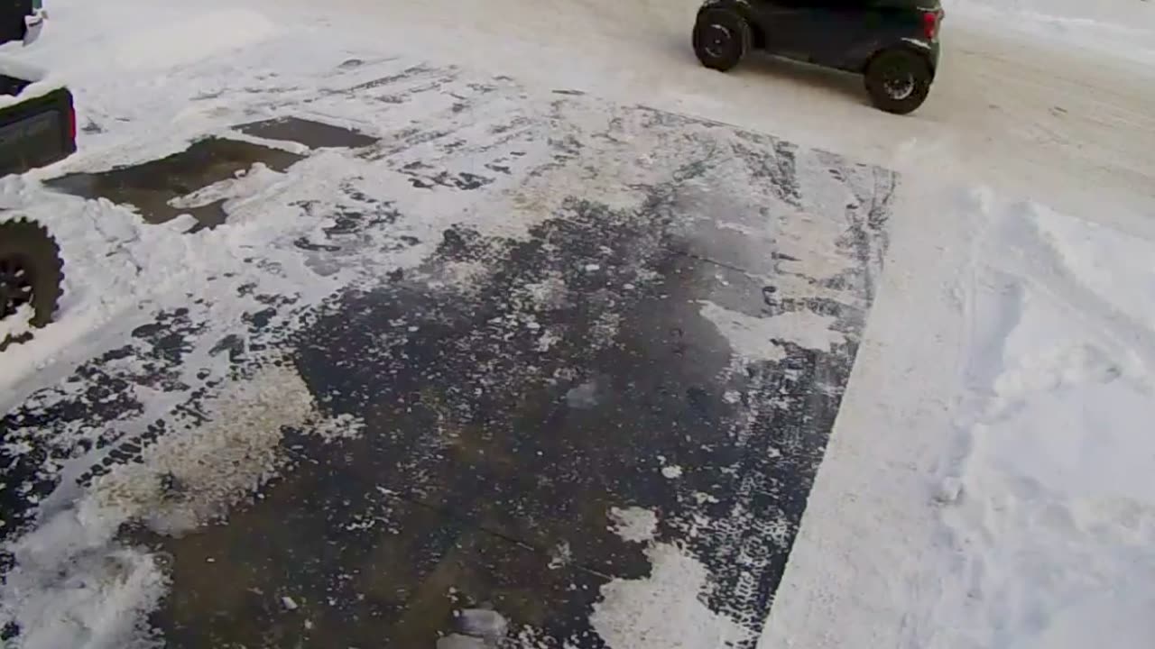 Smart Car Drifts Into Driveway