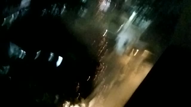 Fireworks In Front Of Window At 10th Floor