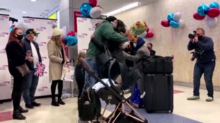 Families reunite at JFK as travel bans are lifted