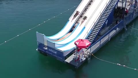 Riding the tallest floating waterslide in the world