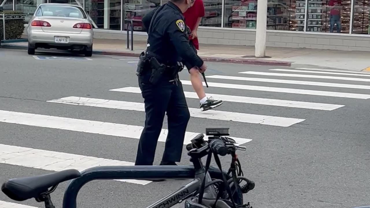 Aggressive Man Faces Off With Police Officer