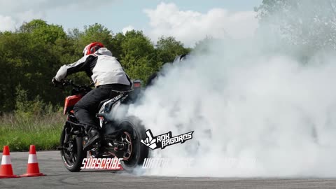 Moto drift between girls and men in a forest