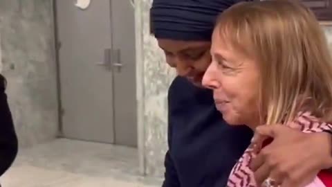 Ilhan Omar hugs pro-Palestinian protestors from the Code Pink group