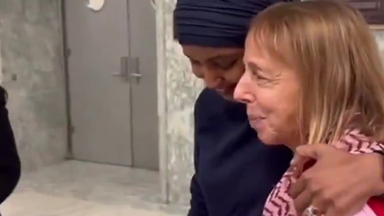 Ilhan Omar hugs pro-Palestinian protestors from the Code Pink group