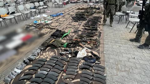 Massive Cashe of Weapons including Hamas branded RPGs Found in a School Complex in Gaza