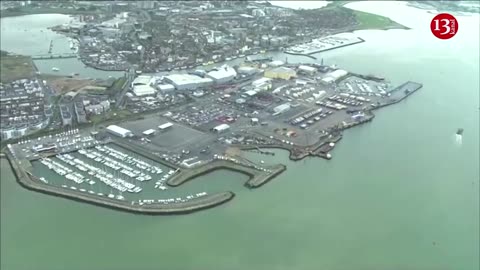 Aerial footage shows scale of oil leak into southern England harbour