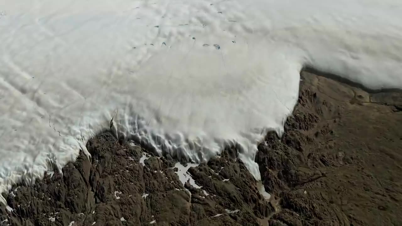 Massive Crater Discovered Under Greenland Ice