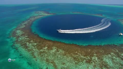 Large ocean blue hole. Width 300m and depth 140m