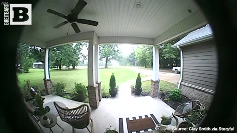 SHOCKING! Lightning Bolt Strikes Man's Tree SECONDS After He Steps Under Porch