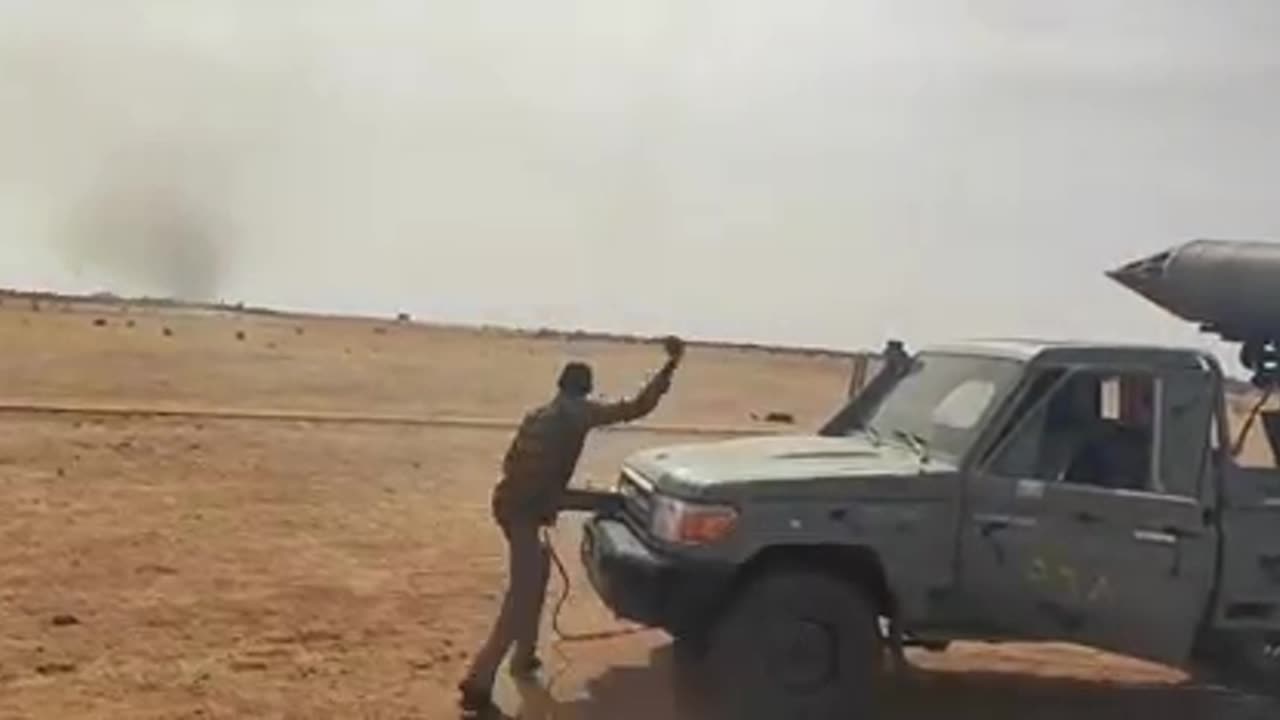SAF firing at RSF with a (UB-16?) on a Toyota