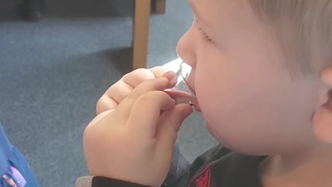Son taking communion