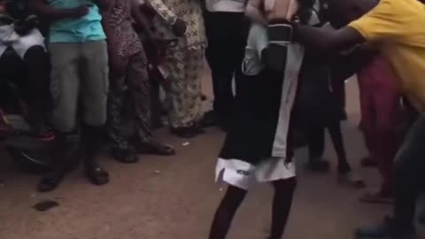 Young girl shows perfect head movement during her sparring session