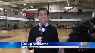 Newark students play New Jersey State Troopers in basketball