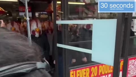 L214 activists disguised as chicken invade a Burger King in Paris