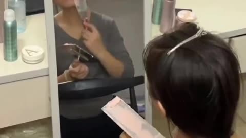 Plastering Her Makeup On