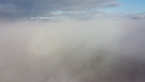 Clouds like a white quilt, covered the shy face of the sky.