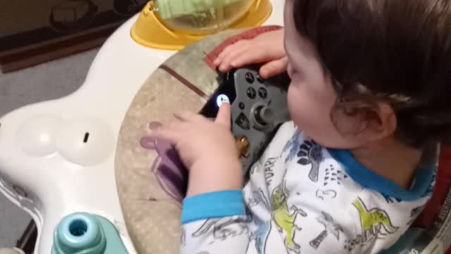 My son learing how to use an xbox one controller