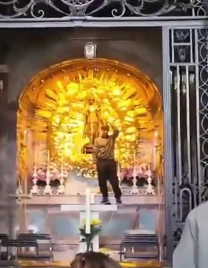 Afghan Asylum Seeker Climbs Alter - Puts on Crown of the Famous Black Madonna in Switzerland