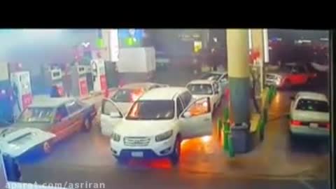 The terrifying moment a car catches fire at a petrol station