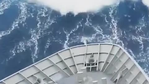 Humongous wave covers giant boat