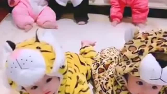 Cute twin babies playing.............