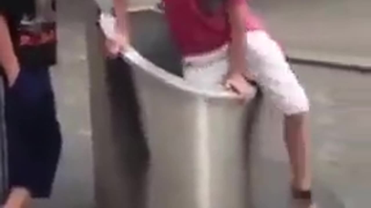 Kid gets trapped in the belly of a giant Swiss rubbish compactor 😳