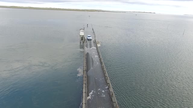 Brave Taxi Parts the Sea and Gets Stuck on Holy Island