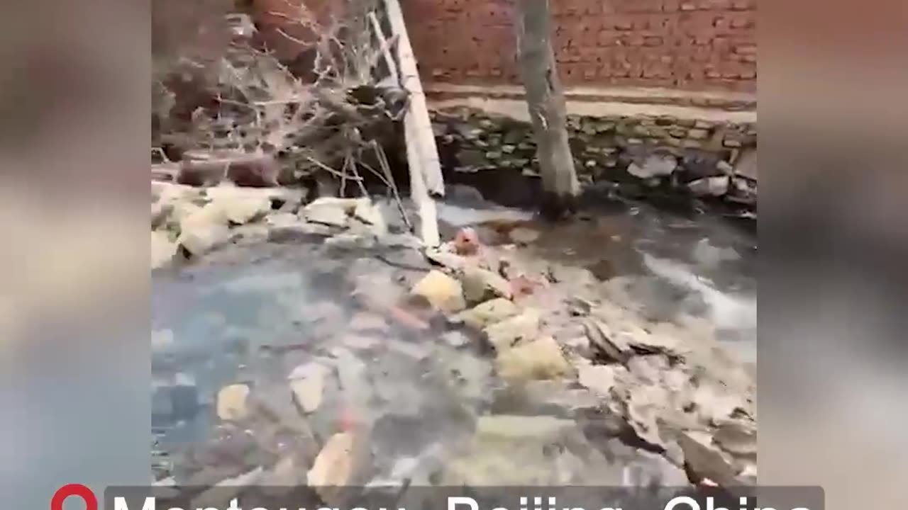 A video shows that a spouting spring emerged in a village near Beijing after the flooding