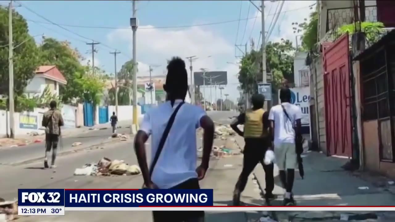 Haiti PM promises to resign as crisis grows.