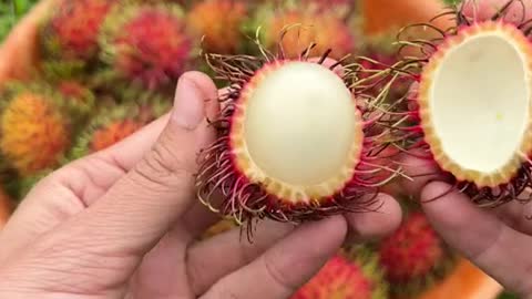 Rambutan. Related to lychee and tastes the same.