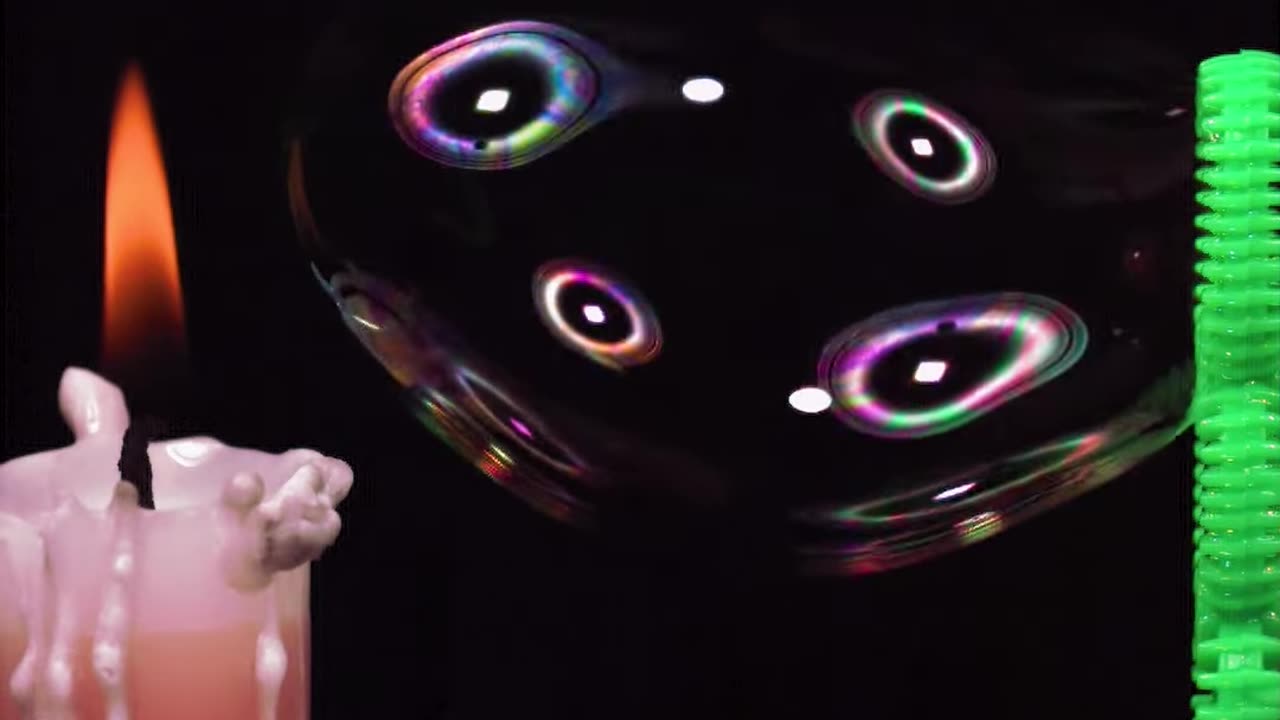 Blowing a Soap Bubble With Gas