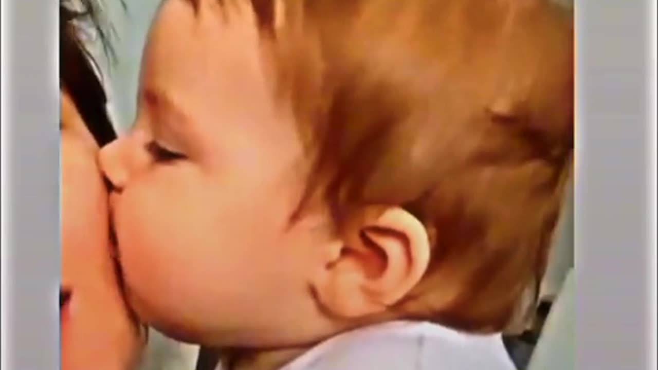 cute boy kissing her mom