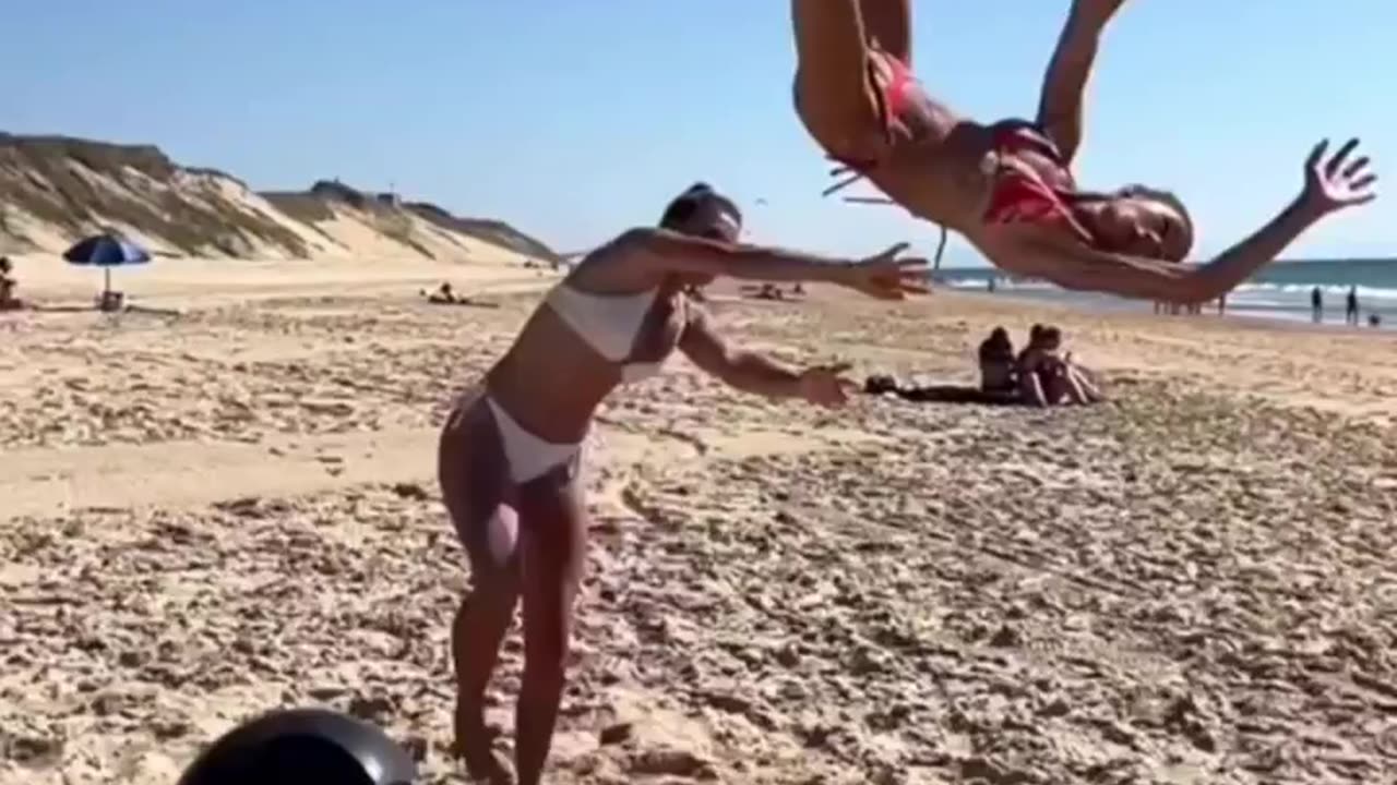 chicks doing gymnastics at the beach doesn't end well.