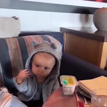 Child learns to bye in a fun way