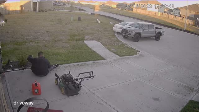 Edge Trimming Man Walks Backwards into Mower