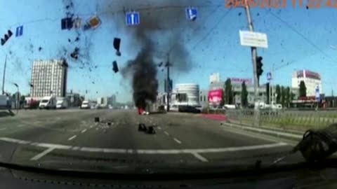 Dashcam catches missile barely missing traffic in Kyiv