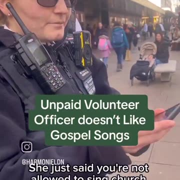 London Volunteer Police Officer Sticks Out Tongue, Harasses Christians For Singing Church Songs