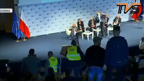 A traitor to Poland gets hit with eggs...