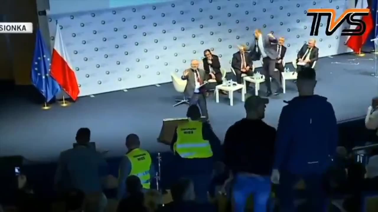 A traitor to Poland gets hit with eggs...