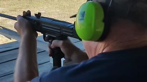 My father shooting a UZI